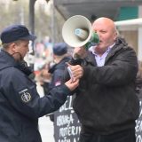 Antiratna akcija Žena u crnom, Spasić ometao skup 6