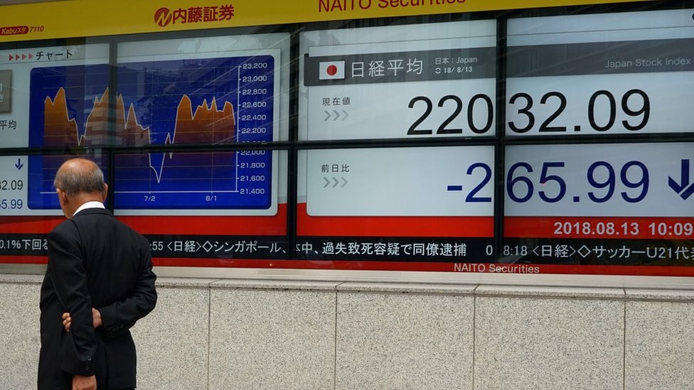 Stock board in Tokyo on August 13