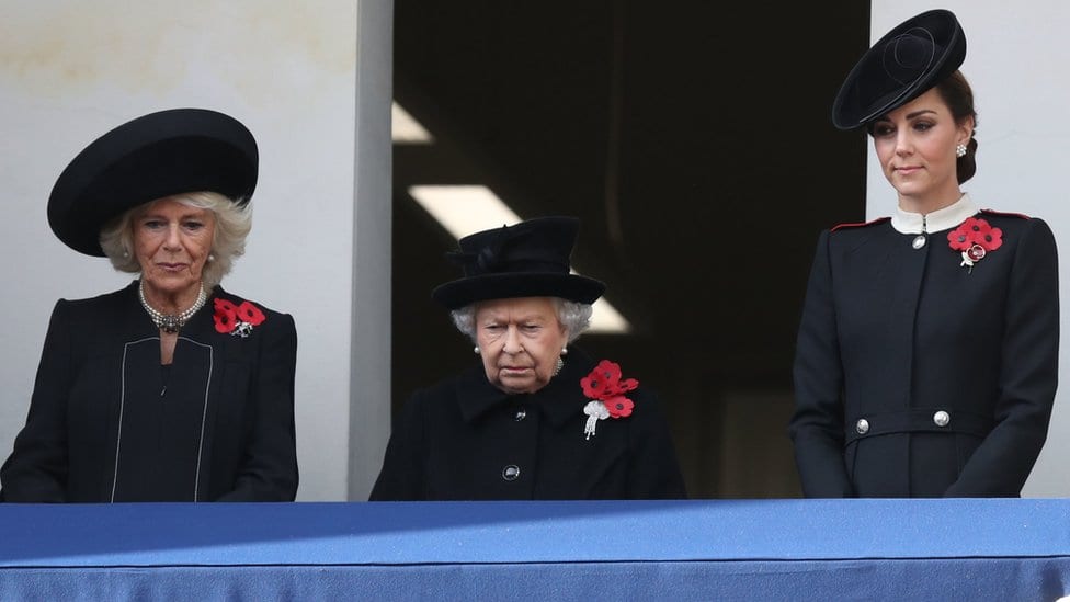 The Duchess of Cornwall, Queen Elizabeth II and the Duchess of Cambridge on a balcony during the remembrance service