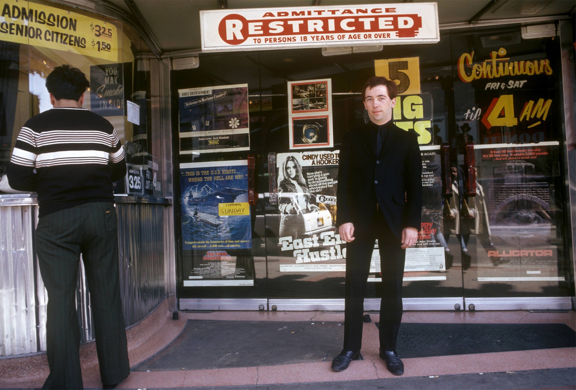 Pete Shelley poses outside a cinema in Canada