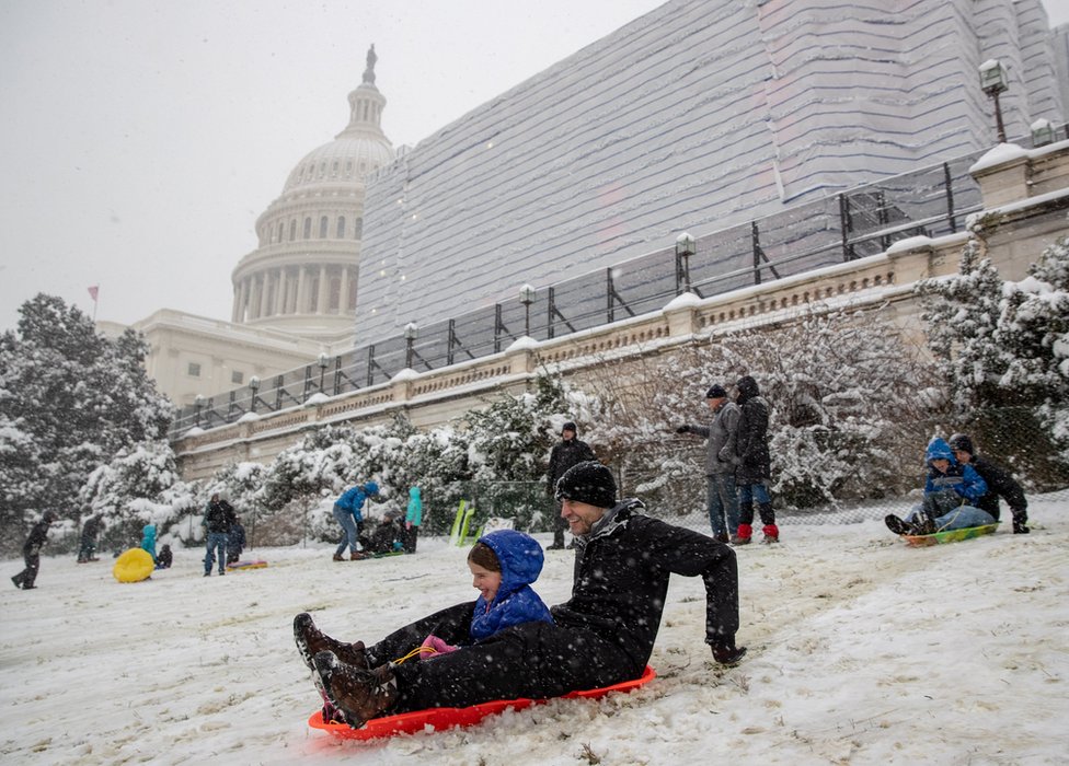 People sledging on Capitol Hill in Washington
