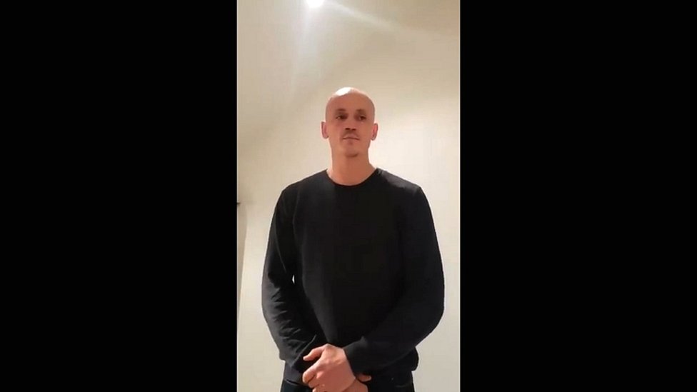 A video grab made on 7 January 2019 shows former boxer Christophe Dettinger broadcasting a message of apology for punching police officers during a "yellow vest" protest in Paris