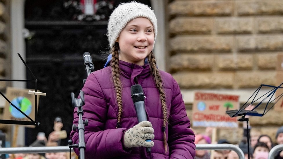 Swedish climate activist Greta Thunberg speaks on stage during a demonstration of students calling for climate protection on 1 March 2019 in front of the city hall in Hamburg, Germany