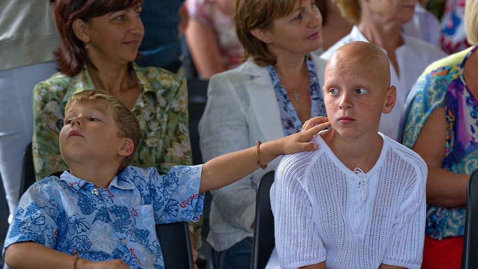Participants of the programme at a ceremony