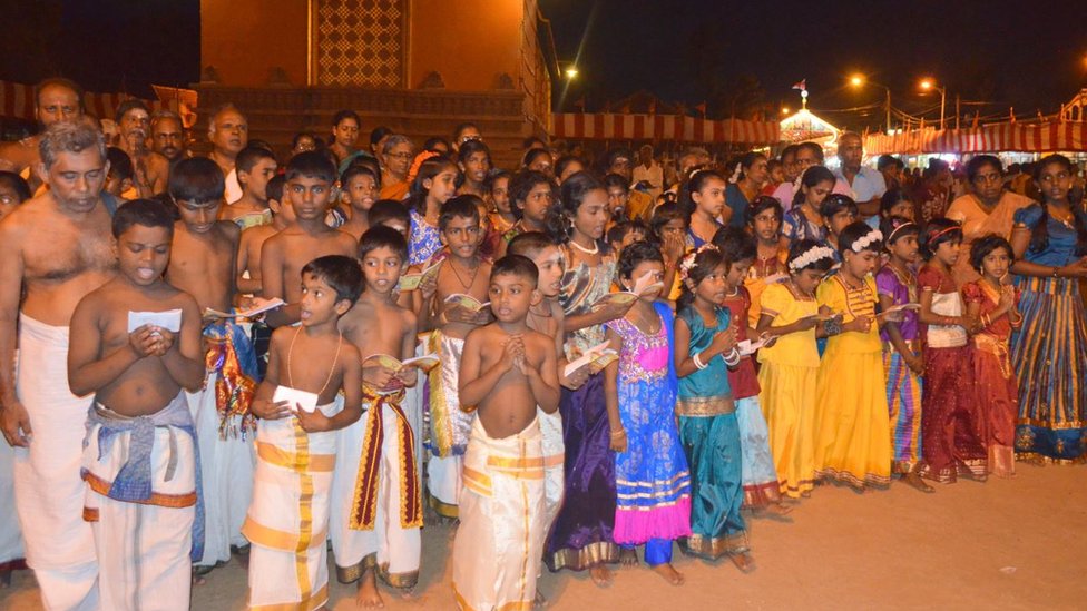 Tamil Hindu children sing religious prayers during the Nallur Festival at Jaffna,