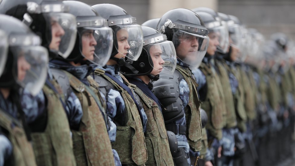 Russian riot police stand in readiness during a liberal opposition rally against unfair Moscow State Duma elections in the centre of Moscow, Russia, 10 August 2019.