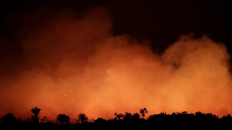 Night photo showing smoke in the Amazon