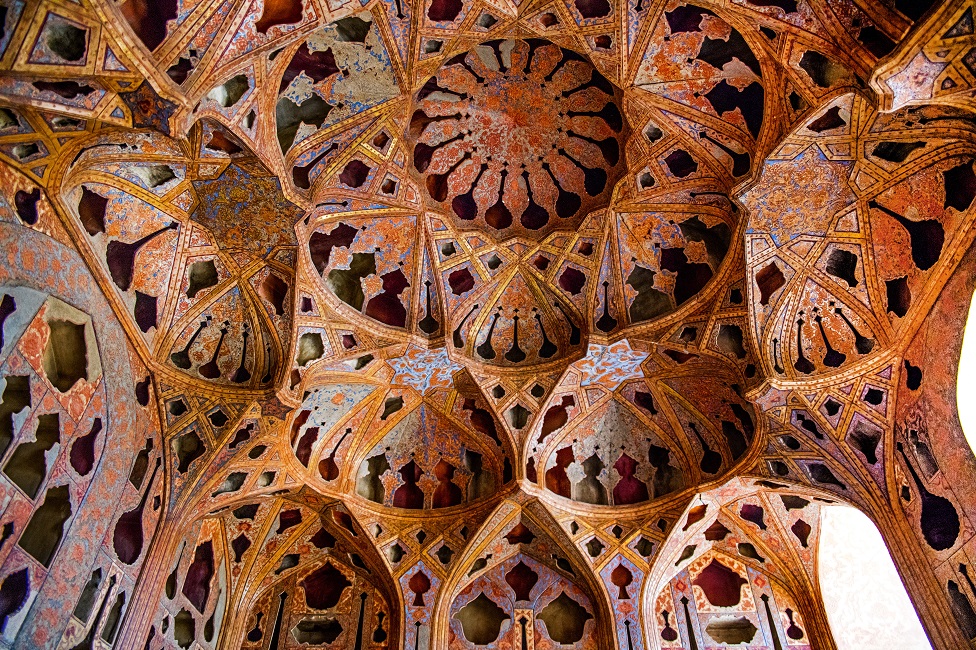 General view of the famous acoustic ceiling with all the small cavities in clear view - the plaster is a terracotta colour.