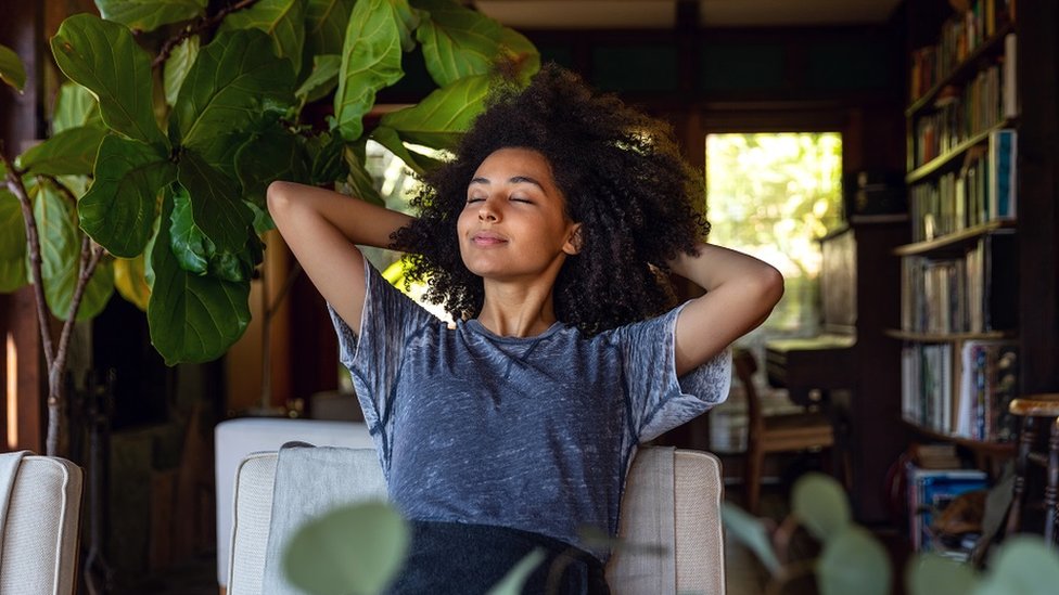 Woman relaxed, enjoying her surroundings