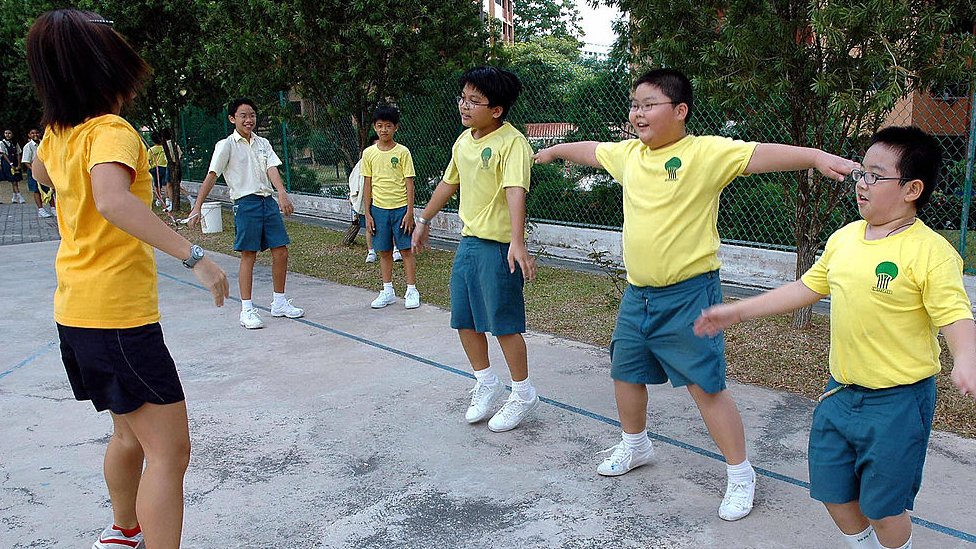 Kids exercising in Singapore
