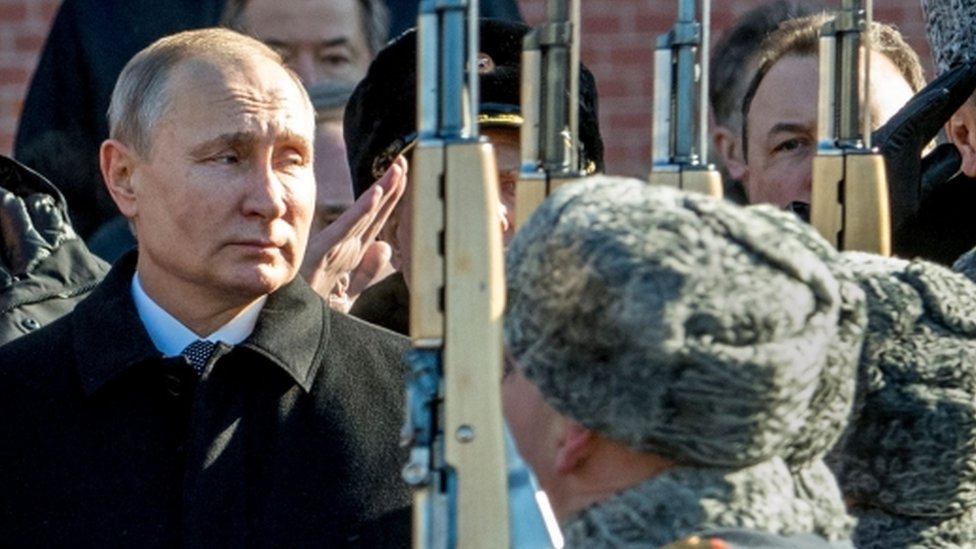 Russian President Vladimir Putin watches military parade in Moscow. File photo
