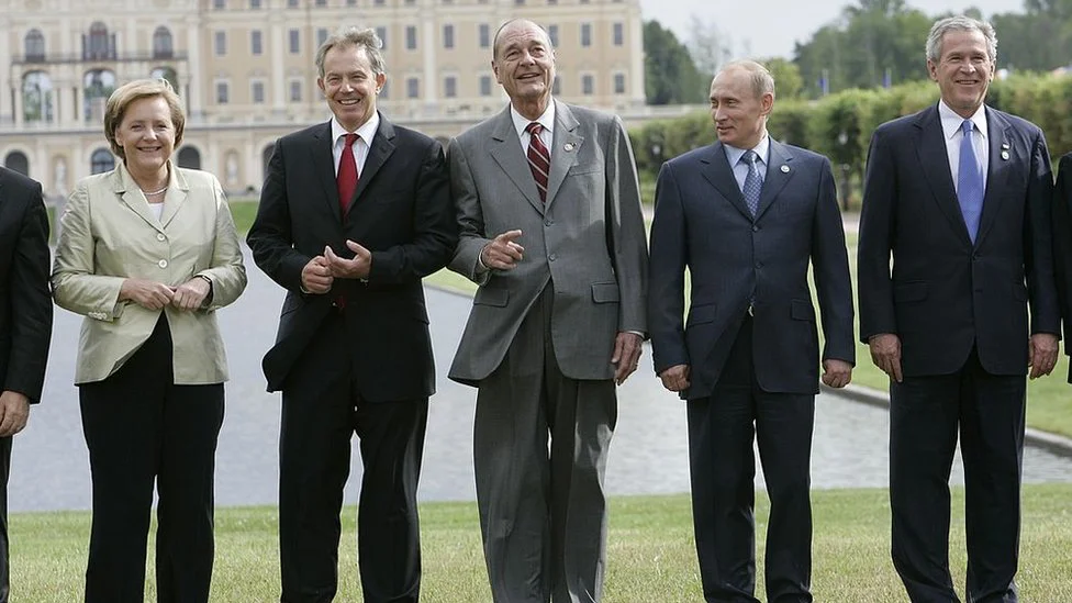 Vladimir Putin: 20 godina u 20 fotografija 8 From left to right: Angela Merkel, Tony Blair, Jacques Chirac, Vladimir Putin and George W Bush