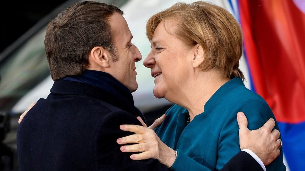 Makron i Merkel na ceremoniji potpisivanja Ahenskog sporazuma