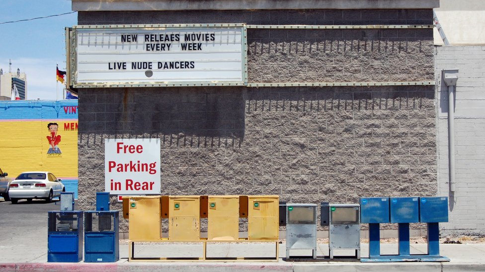 Side view of Showgirl Video advertising boarding