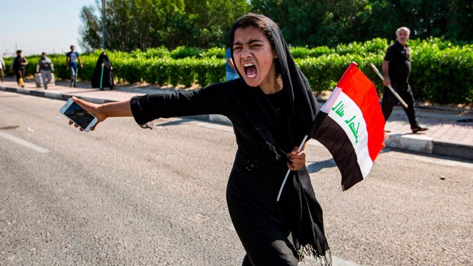 Girl protesting in Iraq