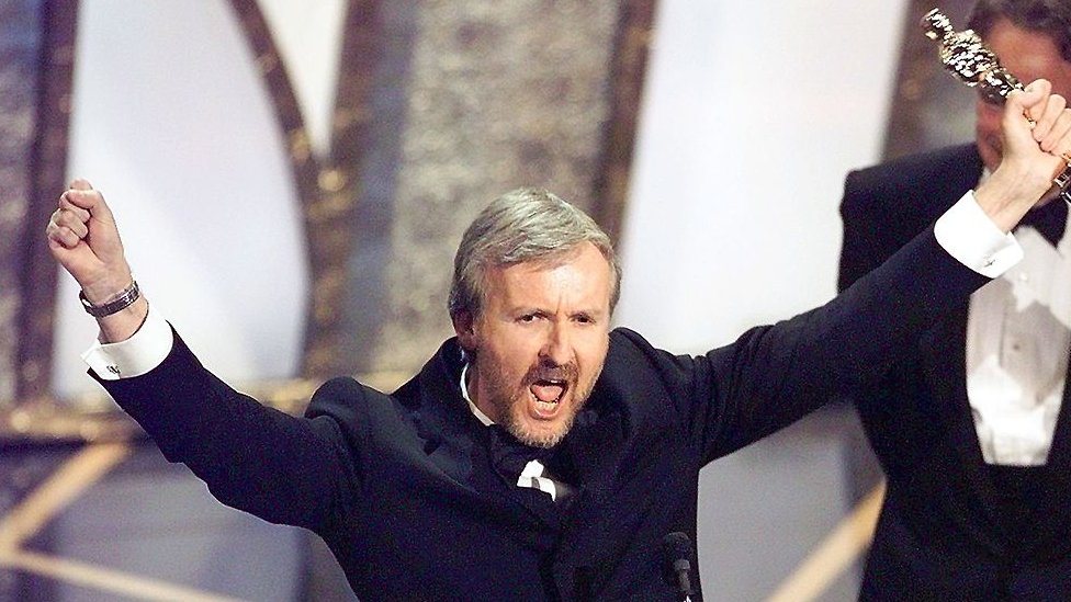 James Cameron celebrating Titanic's Best Picture win