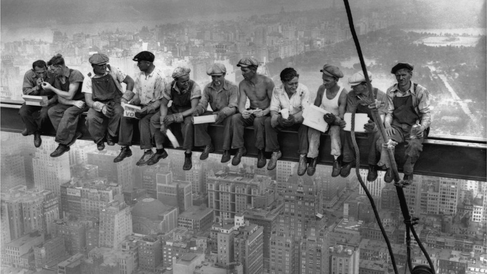 Iconic image showing construction workers eating their lunches on top of a steel beam (girder, crossbeam) 800 feet above ground, at the building site of the RCA Building in Rockefeller Centre