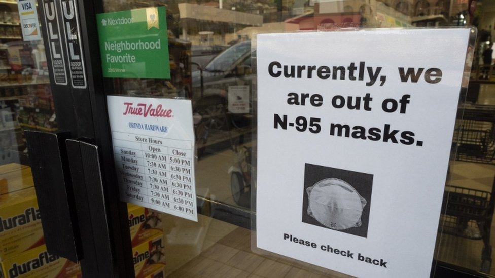 A sign hangs on a True Value hardware store in Orinda, east of San Francisco, 28 February 2020