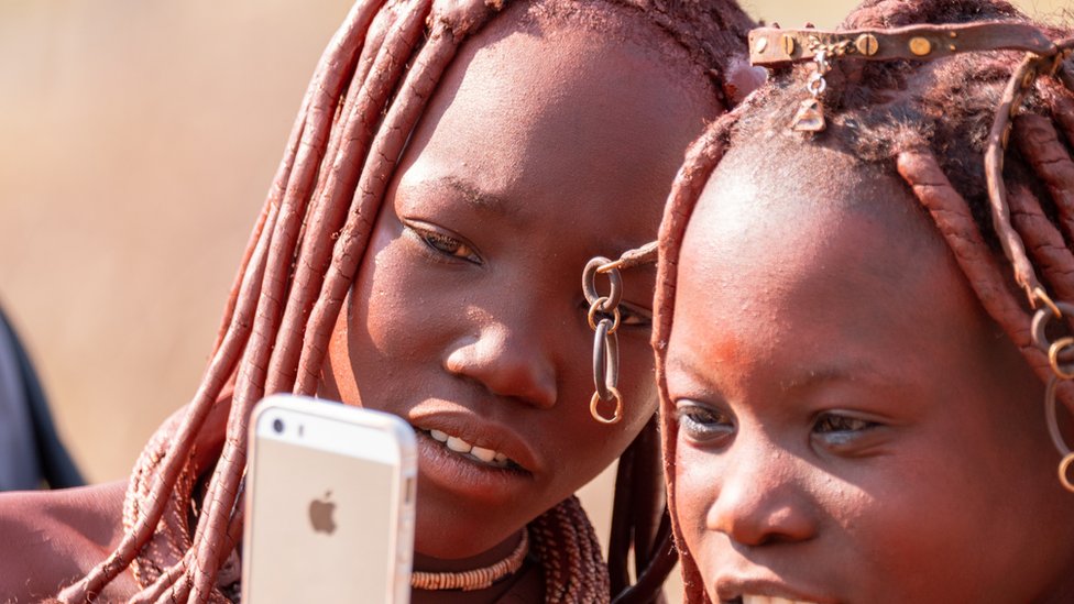 Two girls from the Himba tribe near Outjo, Northern Namibia