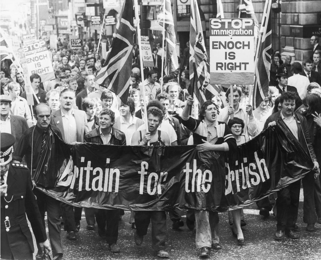 Kako se raspravljati sa rasistom: Pet oborenih mitova 4 Meat porters march on the UK Home Office in 1972, bearing a "Britain for the British" banner