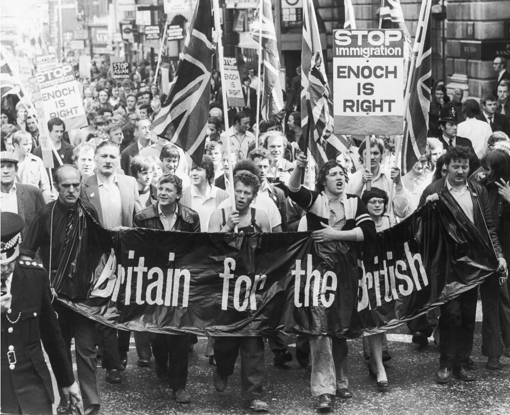 Meat porters march on the UK Home Office in 1972, bearing a "Britain for the British" banner