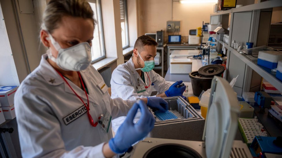 Italian army doctors work at the chemical analysis laboratory of the scientific department of the Celio Military Polyclinic Hospital