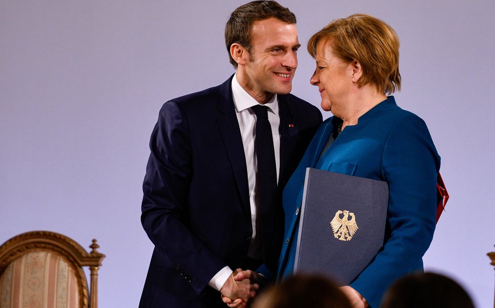 German Chancellor Angela Merkel and French President Emmanuel Macron sign the Aachen Treaty on January 22, 2019