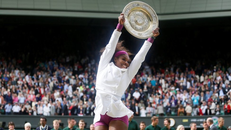 Serena Williams of the U.S. holds her trophy after winning the Wimbledon tennis championships in London in 2012.