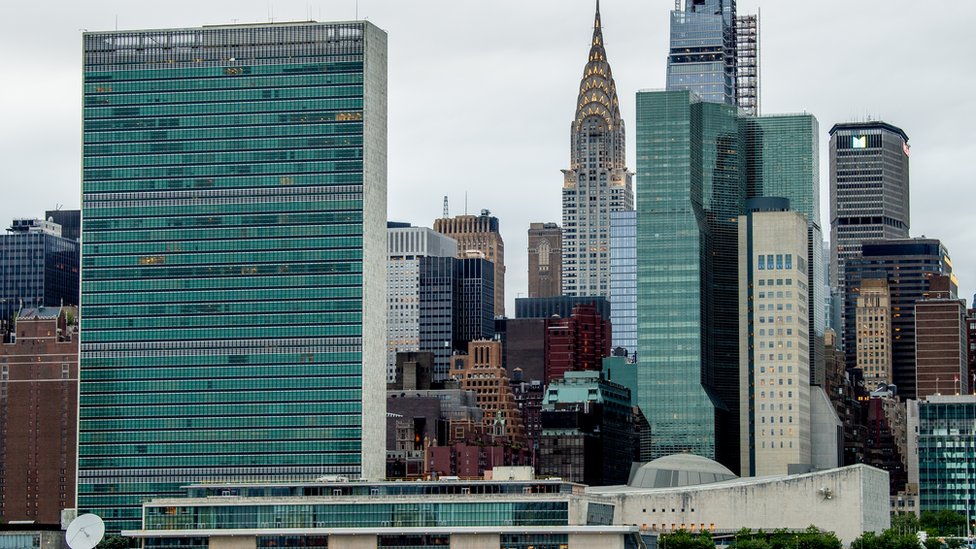 A view of the UN Headquarters and Chrysler Building behind it, as seen from the Gantry Plaza State Park in Long Island City on 23 May 2020 in New York