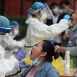 Kina ublažava protivepidemijske mere u Pekingu 10