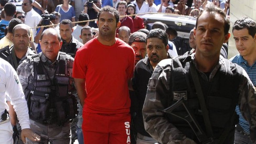 Bruno, being taken into police custody in July 2010