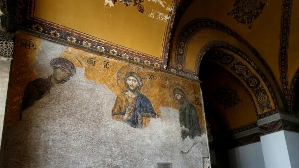 Visitors look at mosaics at Hagia Sophia, a Unesco World Heritage Site, in Istanbul, August 2017