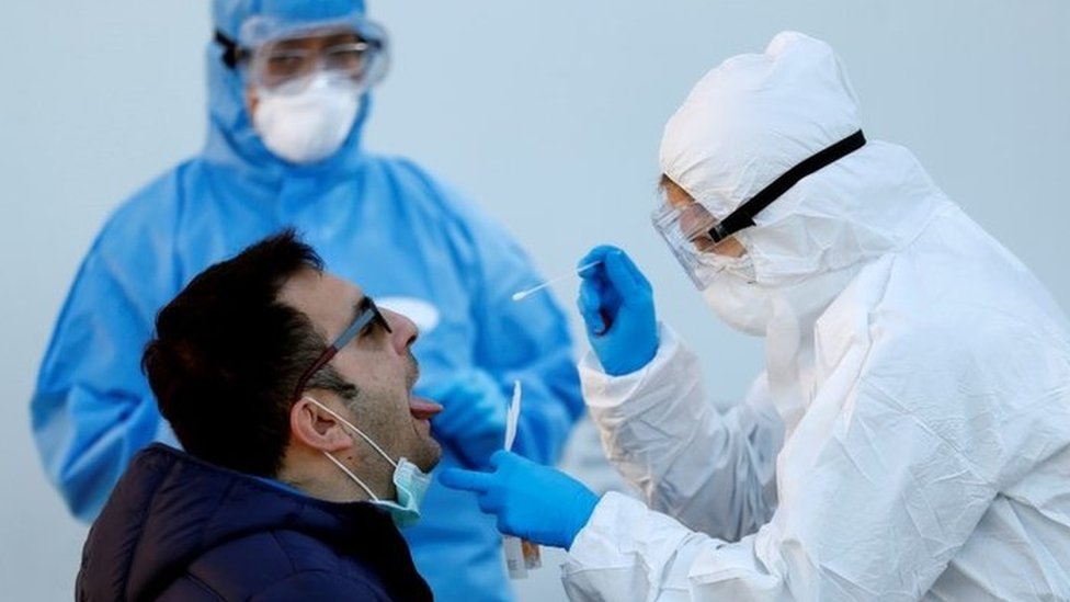A man is tested for coronavirus in Rome