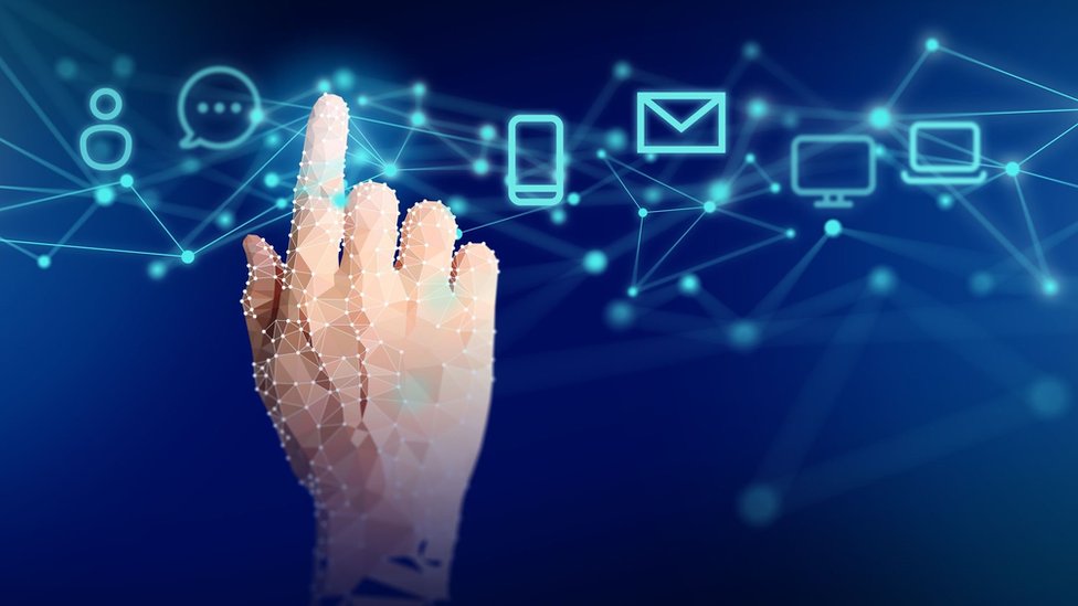 A finger hovering over several app icons