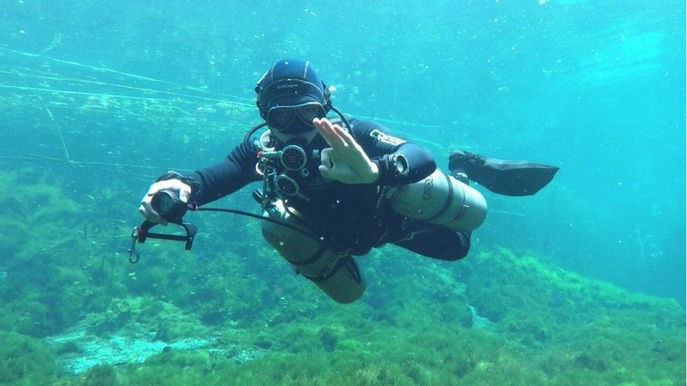 Eugene Cheow diving in a cenote (a natural sinkhole) in Mexico's Cozumel island
