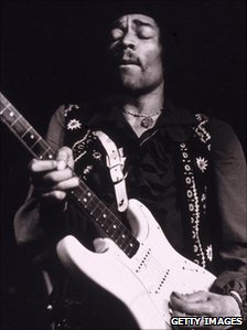 Jimi Hendrix performs onstage, late 1960s