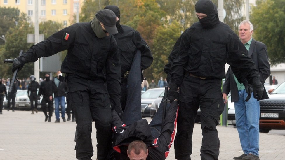 Police detain a protester in Minsk on 27 September 2020