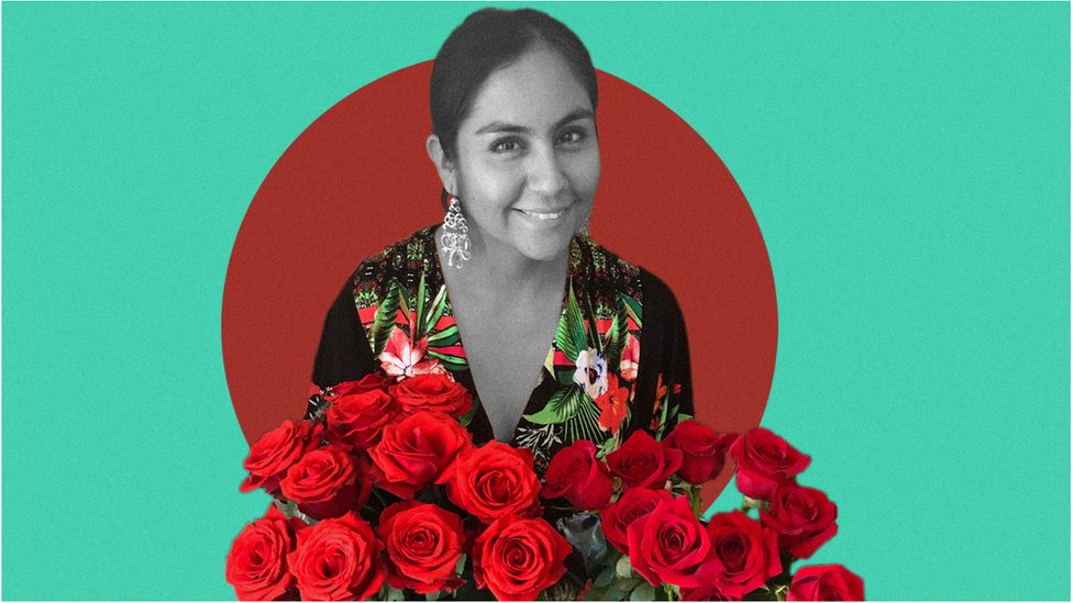 Yazmin Salazar poses with a bouquet of roses