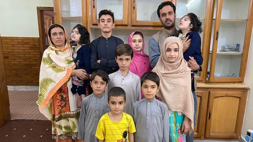 Safa and Marwa with their family in Pakistan