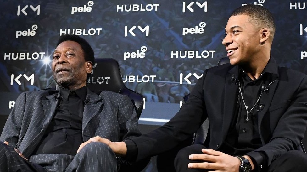Pele (left) and Kylian Mbappe at a promotional event in April 2019
