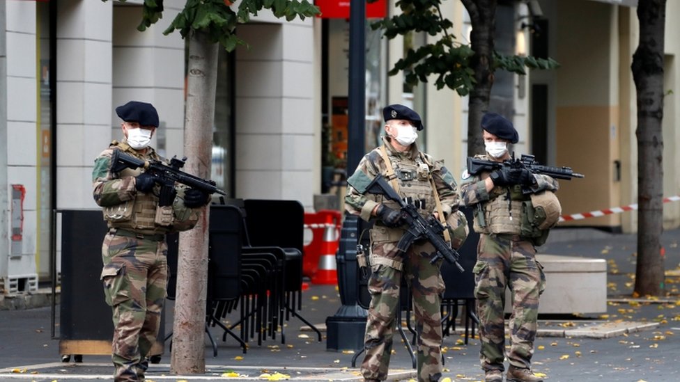 Special forces stand guard near the scene of the attack