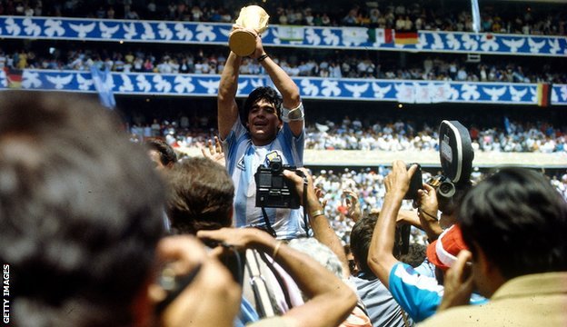 Diego Maradona holds the World Cup aloft in 1986