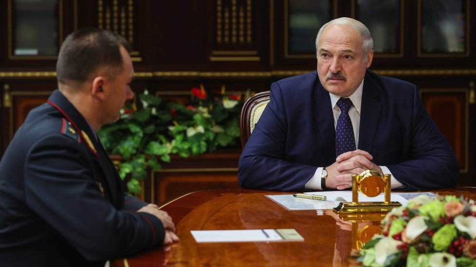 President Alexander Lukashenko pictured with his minister of Internal Affairs, Ivan Kubrakov (L)
