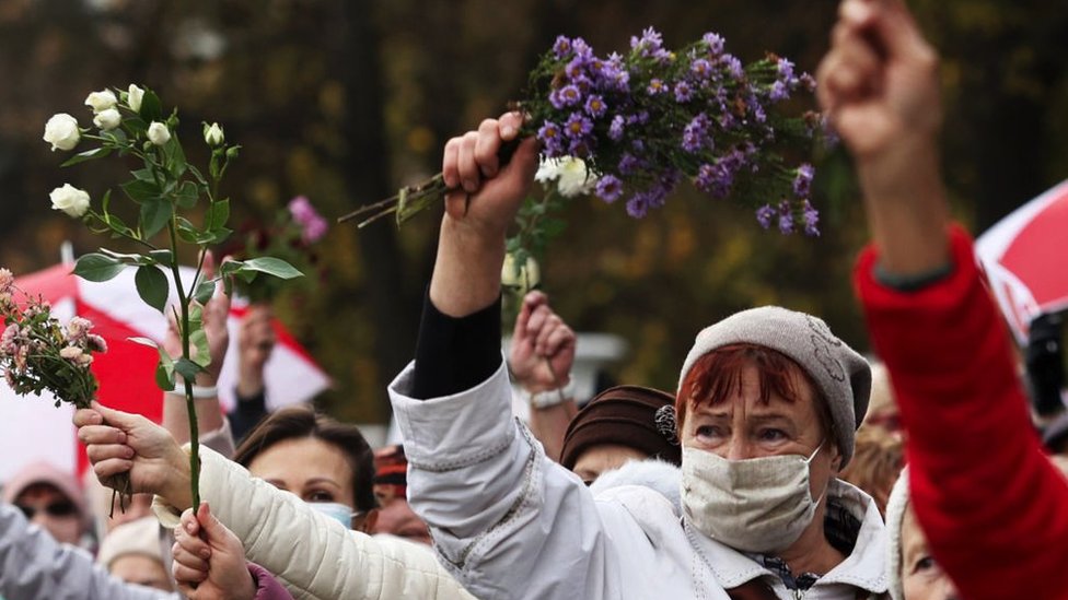Belarusian women demand free and fair elections during a protests in October 2019