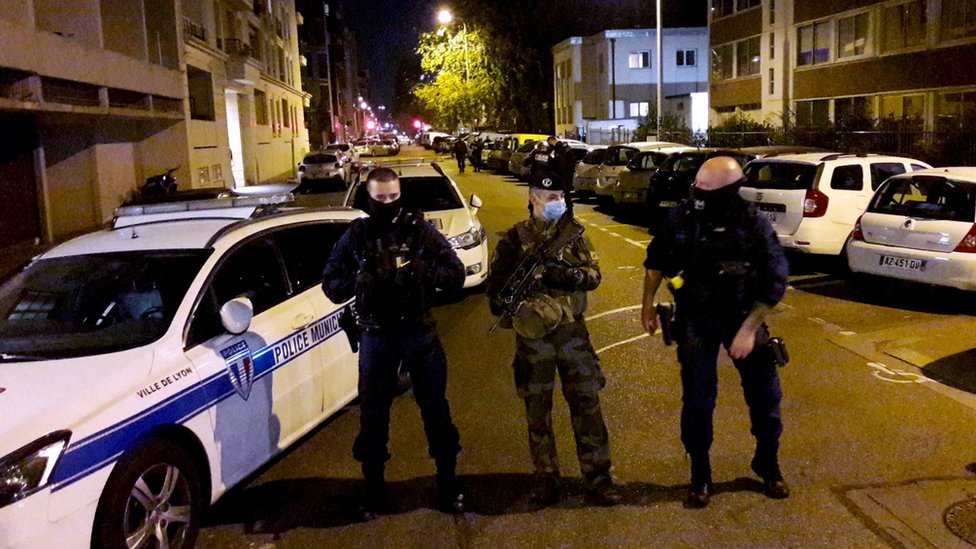 Police secure a street after a Greek Orthodox priest was shot and injured at a church in the centre of Lyon, France, 31 October, 2020