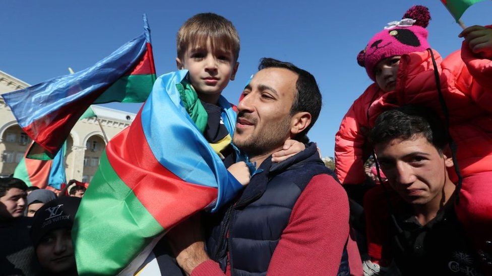 Local people celebrate the end of the military conflict over Nagorno Karabakh.