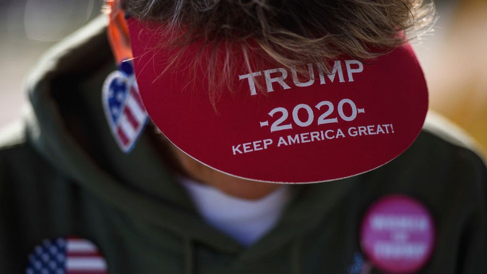 Trump supporter wearing Trump 2020 peaked cap