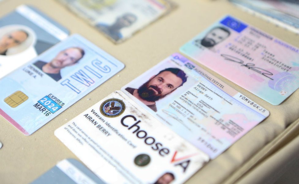 ID cards of people linked to an operation denounced by Venezuelan President Nicolas Maduro are displayed during a meeting with members of the Armed Forces in Caracas, Venezuela on May 4, 2020