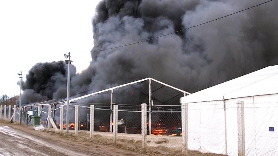 The Lipa migrant camp is seen ablaze near Bihac, Bosnia-Herzegovina