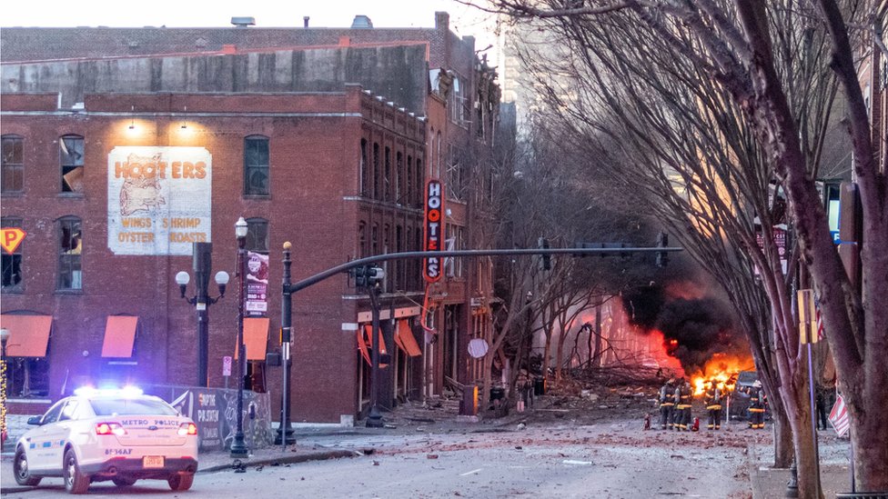 Debris litters the road near the site of an explosion in the area of Second and Commerce in Nashville
